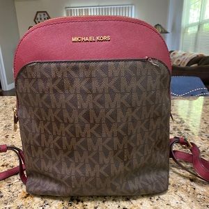 Brown and cranberry Michael Kors backpack